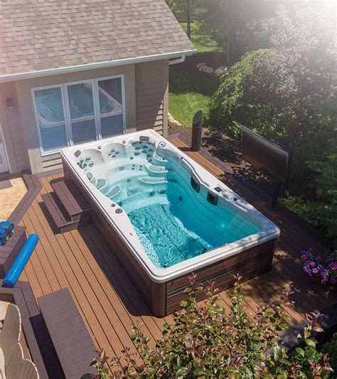 Looking to put a swim spa in your backyard? Check out these inspirational photos! #swimspas # ...