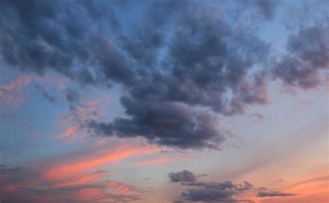 Premium Photo | Spring blue sky at sunset with gray clouds