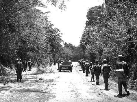 PHOTO: US Army Moving in to Liberate Santo Tomas, Batangas March 1945 ...