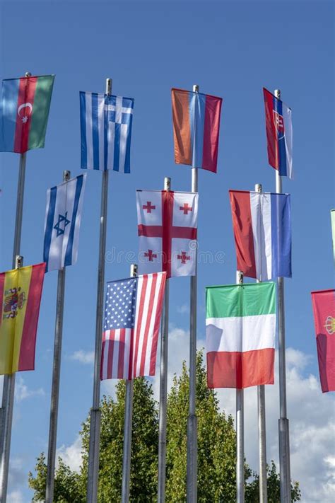 Row of National Flags. World Flags Blowing in the Wind Stock Photo ...