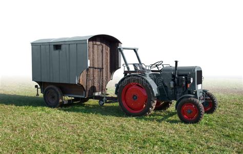 Historic Tractor with Trailer Stock Photo - Image of caravan, hayfield ...