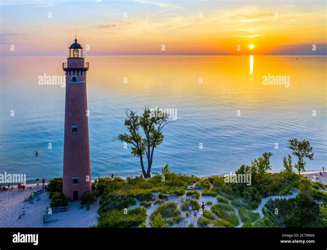 Aerial view of Little Sable Point Lighthouse at sunset over Lake Michigan; Mears, Michigan ...