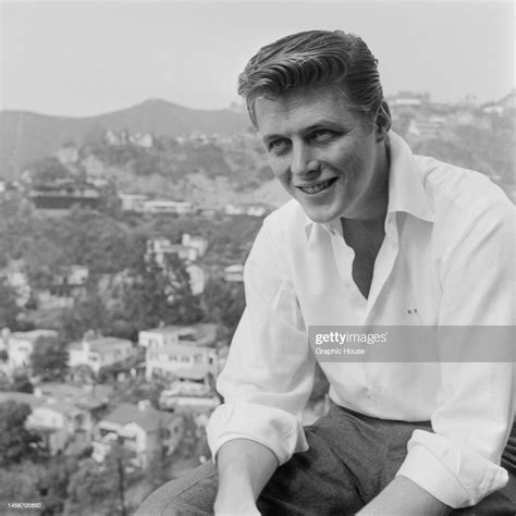 American actor Edd Byrnes , his hair styled in a quiff, wearing a... News Photo - Getty Images