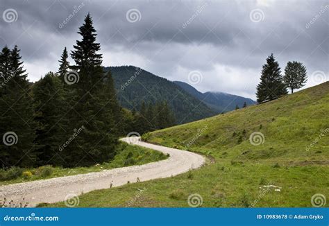 Gravel road stock photo. Image of green, blue, cloudscape - 10983678