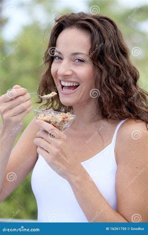 Woman eating healthy food stock photo. Image of conscious - 16261750