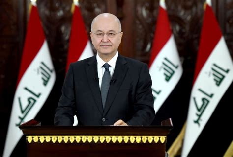 Iraq president bows to protesters and calls for new voting law | PBS NewsHour