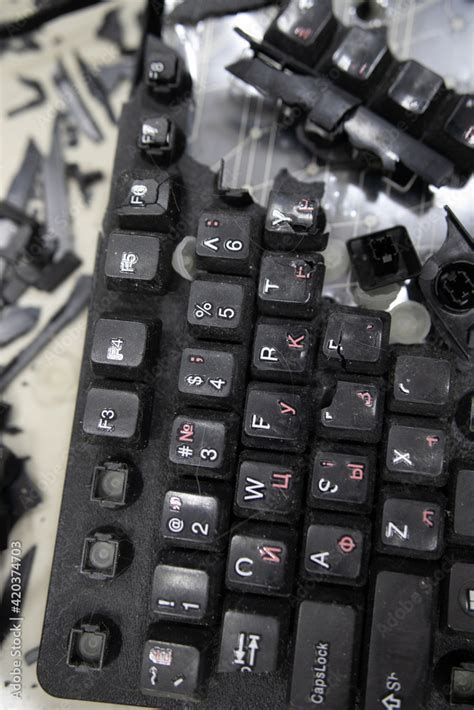 Broken keyboard. Destroyed keyboard. An image of computer frustration. Stock Photo | Adobe Stock