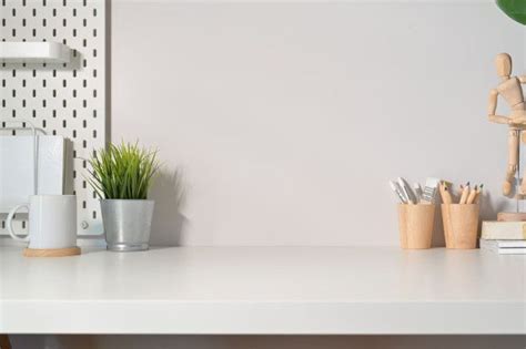 Premium Photo | Modern minimalist desk workspace table and copy space | Minimalist desk ...