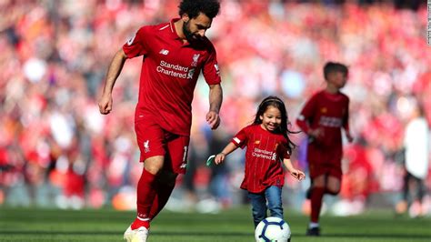 Proud dad Mo Salah looks on as daughter enjoys goal at Anfield - CNN