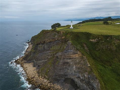 Aerial View of the Lighthouse and Cape Lastres. Bay of Biscay in Northern Spain in Summer Stock ...