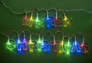 Photo of Colorful glowing round Christmas tree lights | Free christmas ...