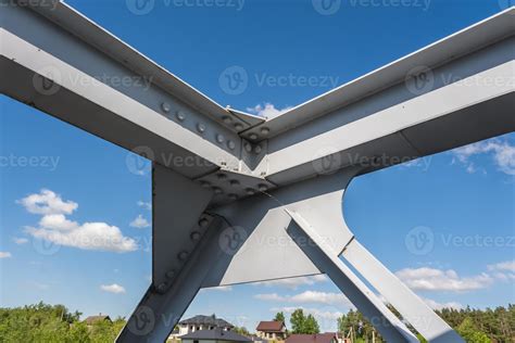 iron steel frame construction of bridge on blue sky background. bridge ...