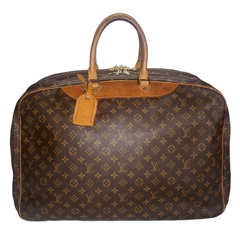 Louis Vuitton Weekender Bag with Iconic LV Monogram and Leather Trim