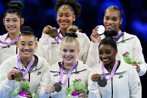 US women's gymnastics team wins historic 7th consecutive world championship title - ABC News
