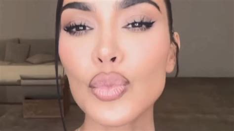 Kim Kardashian hits Kylie Jenner as shocked sister leaps back in pain ...