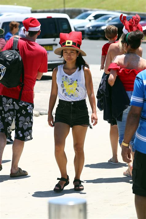 Thousands of Aussies embrace the Christmas season and hit Bondi Beach in very festive summer ...