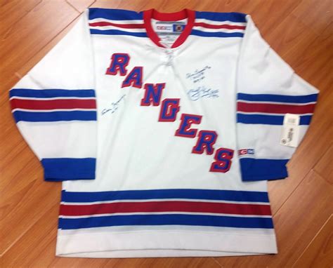 New York Rangers Multi-Signed Retro CCM Hockey Jersey *Marcel Dionne, Cesare Maniago & Edgar ...