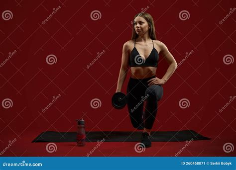 Pretty Woman in Black Sport Wear Doing Lunges with Dumbbells. Stock Image - Image of healthy ...