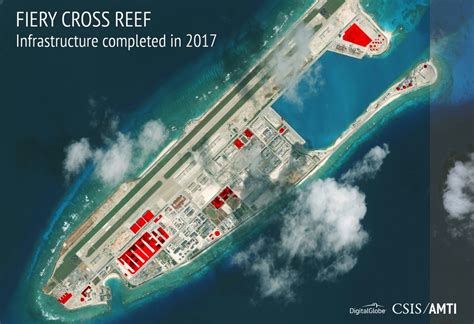 As tensions ease, China keeps building on disputed islands