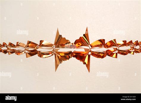 Copper Coloured Christmas Garland Decoration Stock Photo - Alamy