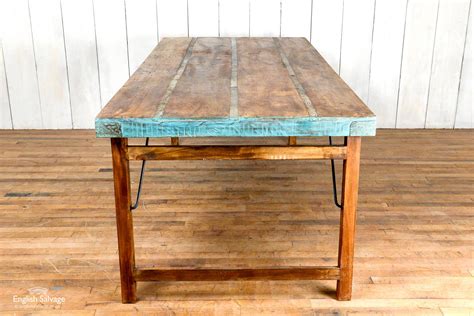 Sturdy folding table from reclaimed wood