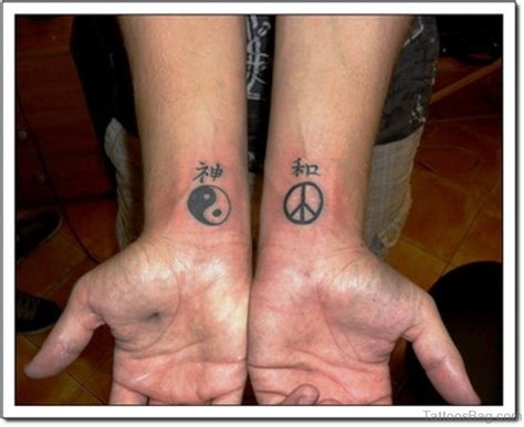 39 Perfect Yin Yang Tattoos On Wrist - Tattoo Designs – TattoosBag.com