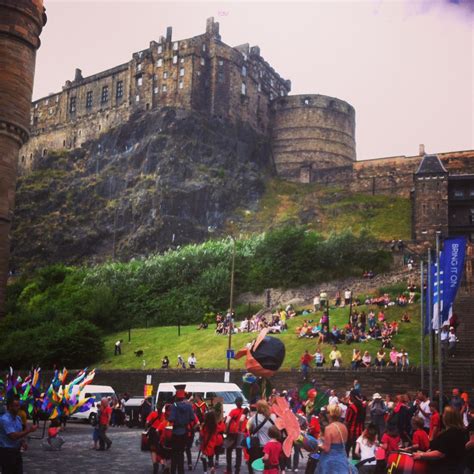 Festival Carnival performers dancing under Edinburgh Castle as part of ...