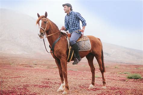 "Man Riding A Horse In A Desert Area" by Stocksy Contributor "Mattia ...