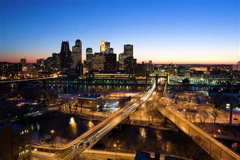 Minneapolis Evening Skyline In Winter by Jimkruger