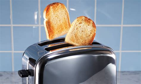 Your Toaster Jas a Secret Crumb Tray That You've Probably Never Emptied — The Latch