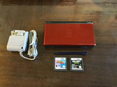Nintendo DS Lite Handheld machine with 2 Games and charger tested works. - iCommerce on Web