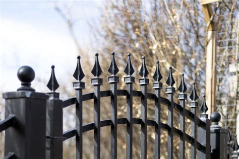 Black iron fence gate closeup - America's Gate Company