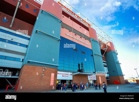 MANCHESTER, UK - MAY 19 2018: Sir Alex Ferguson Bronze statue in front ...