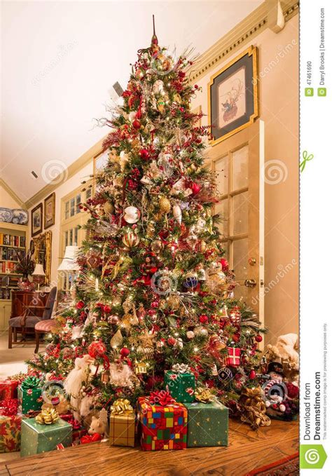 Presents Under Decorated Christmas Tree in Den | Christmas tree background, Cool christmas trees ...