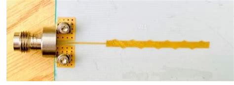 Fabricated microstrip line antenna array. | Download Scientific Diagram