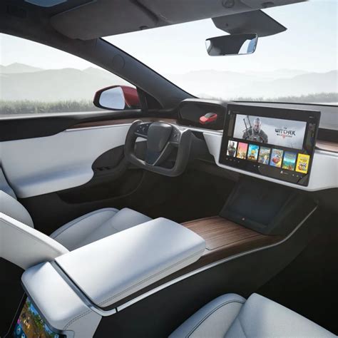 Tesla unveils new Model S with new interior, crazy steering wheel, and ...