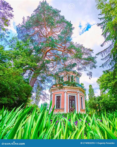 Scenic View on Pink Pavilion through the Leaves of Flowerbed, Sofiyivka ...