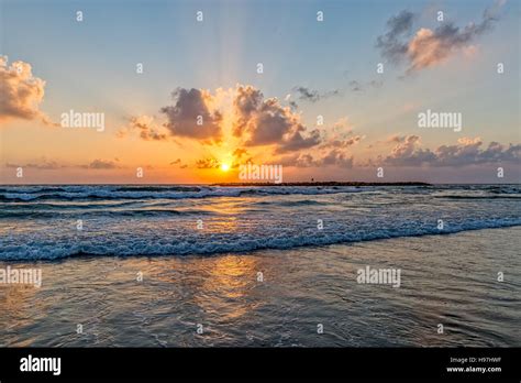 Tel Aviv beach sunset Stock Photo - Alamy