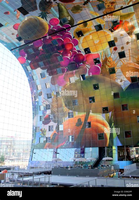 Colourful interior of the Rotterdamse Markthal (Rotterdam Market hall) at Blaak square. Artwork ...