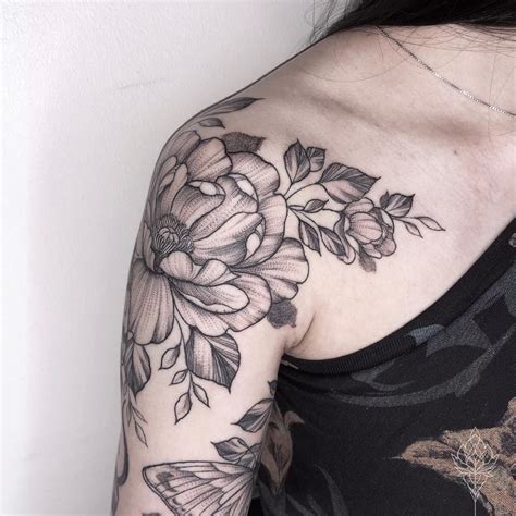 Black and gray flower tattoo on the shoulder - Tattoogrid.net