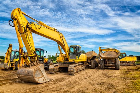 Road Construction Machinery On The Construction Of Highway Stock Photo - Download Image Now - iStock