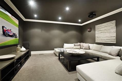 Slick dark basement with white trim | Home theater rooms, Home cinema room, Theatre room