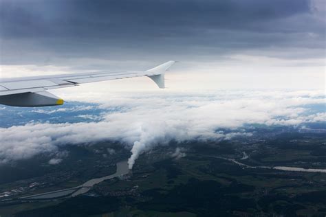 Download Airplane Above Clouds Royalty Free Stock Photo and Image