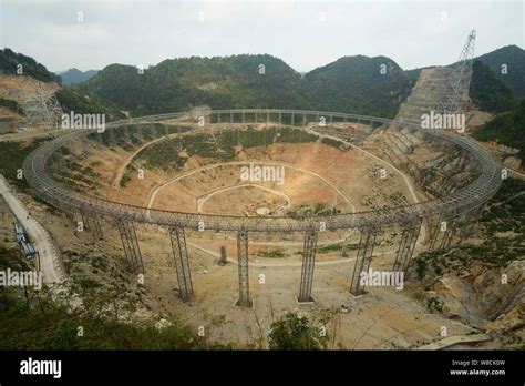 --FILE--View of the construction site of the world's largest radio telescope called FAST (Five ...