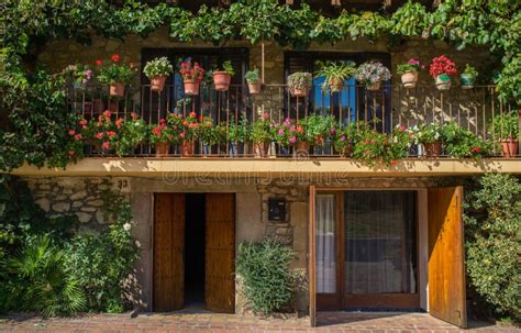 Flower pots on a balcony stock photo. Image of mediterranean - 32422164