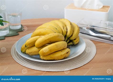 A Bunch of Fresh Banana on a Dining Table in a Modern Kitchen Stock ...