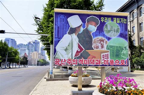 North Korea discusses revising COVID-19 curbs, outbreak 'improving'