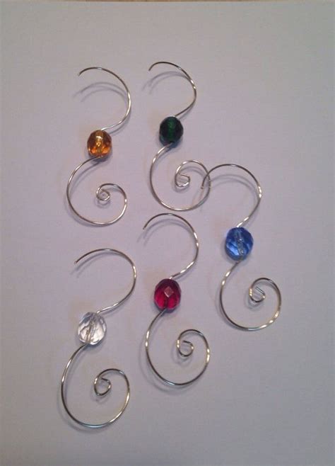 25 Gold Wire Ornament Hooks Hangers with10mm colored glass Czech beads in 2021 | Wire ornaments ...