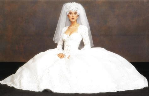 Celine Dion ensured she looked unique on her wedding day by donning a seven-pound Swavorski ...