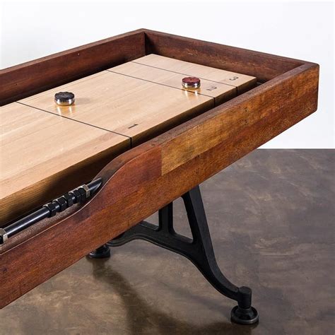 The District Eight shuffleboard table adheres to the design philosophy behind the Lusine ...